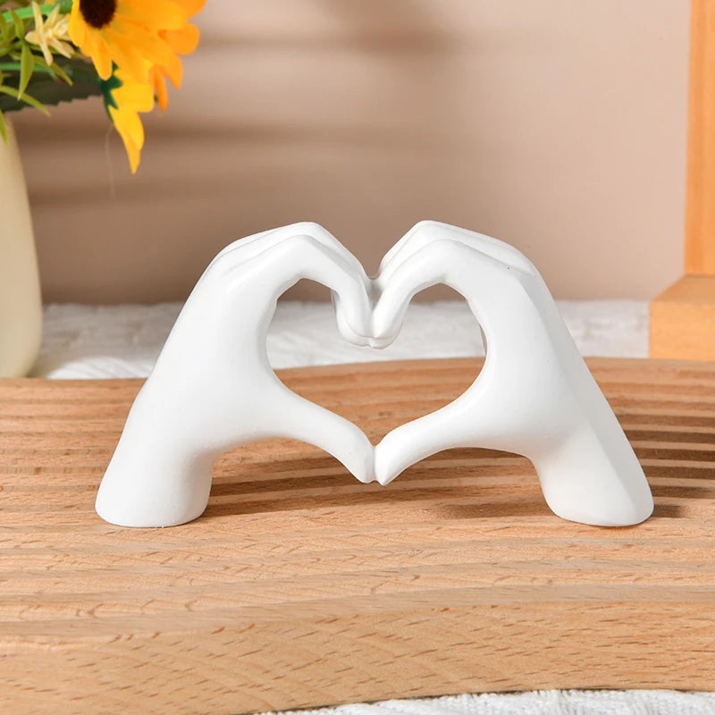 Gold Heart Hand Gesture Sculpture