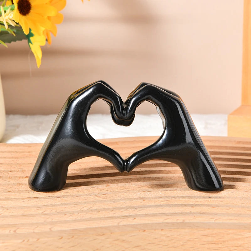 Gold Heart Hand Gesture Sculpture