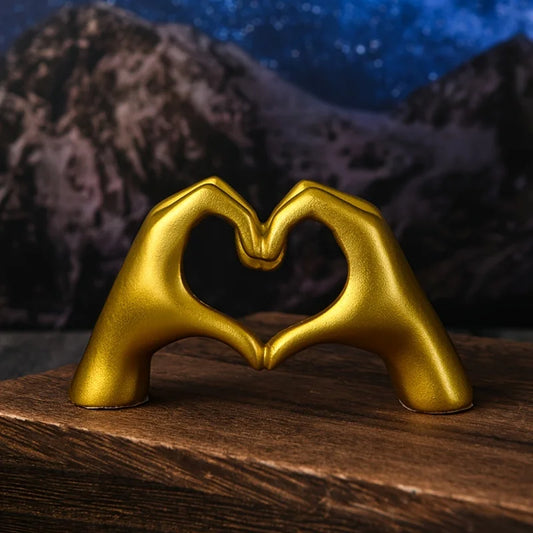 Gold Heart Hand Gesture Sculpture